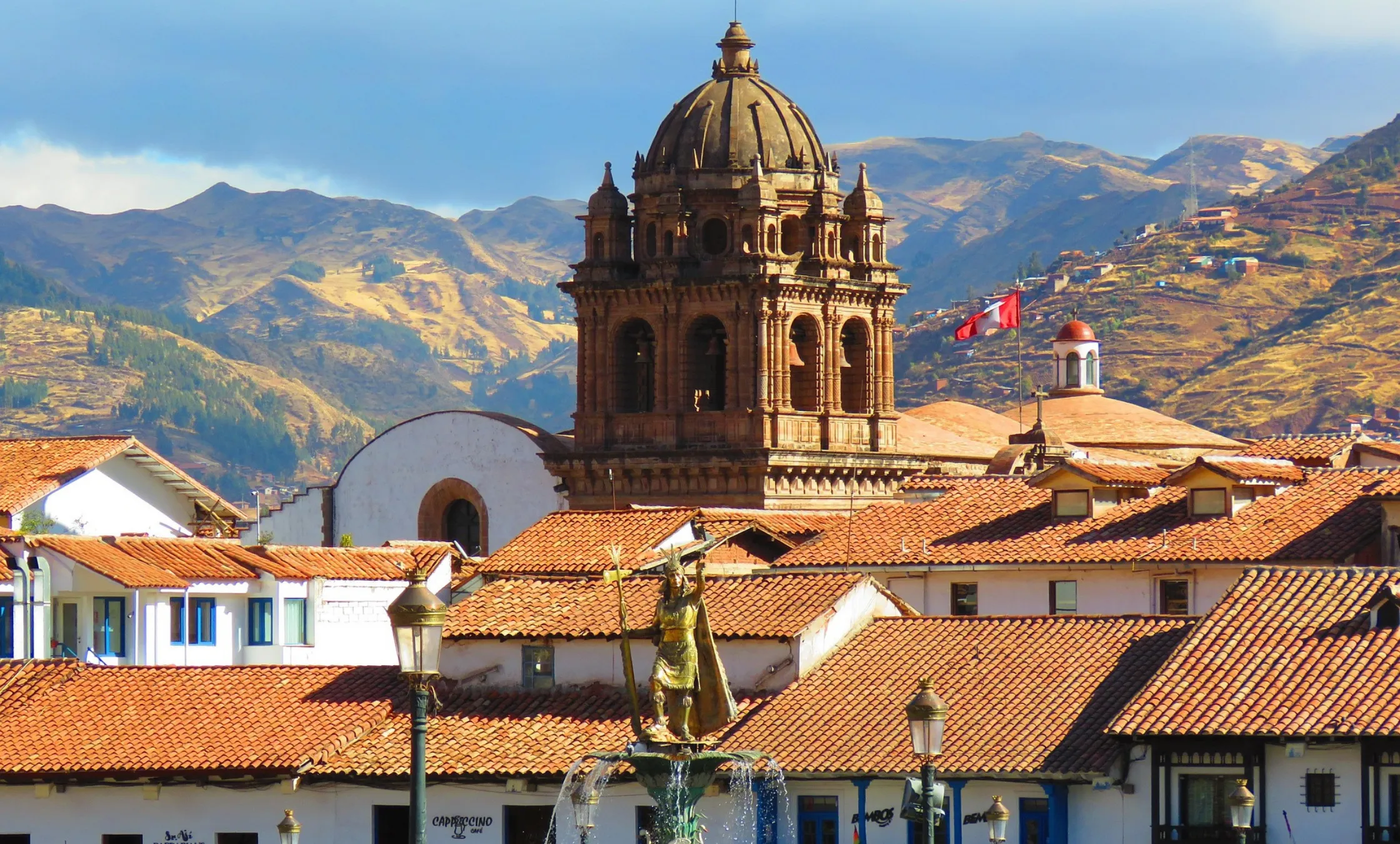 Panoramic view of Cusco, Peru, showcasing its colonial rooftops and the historic Cathedral of Cusco