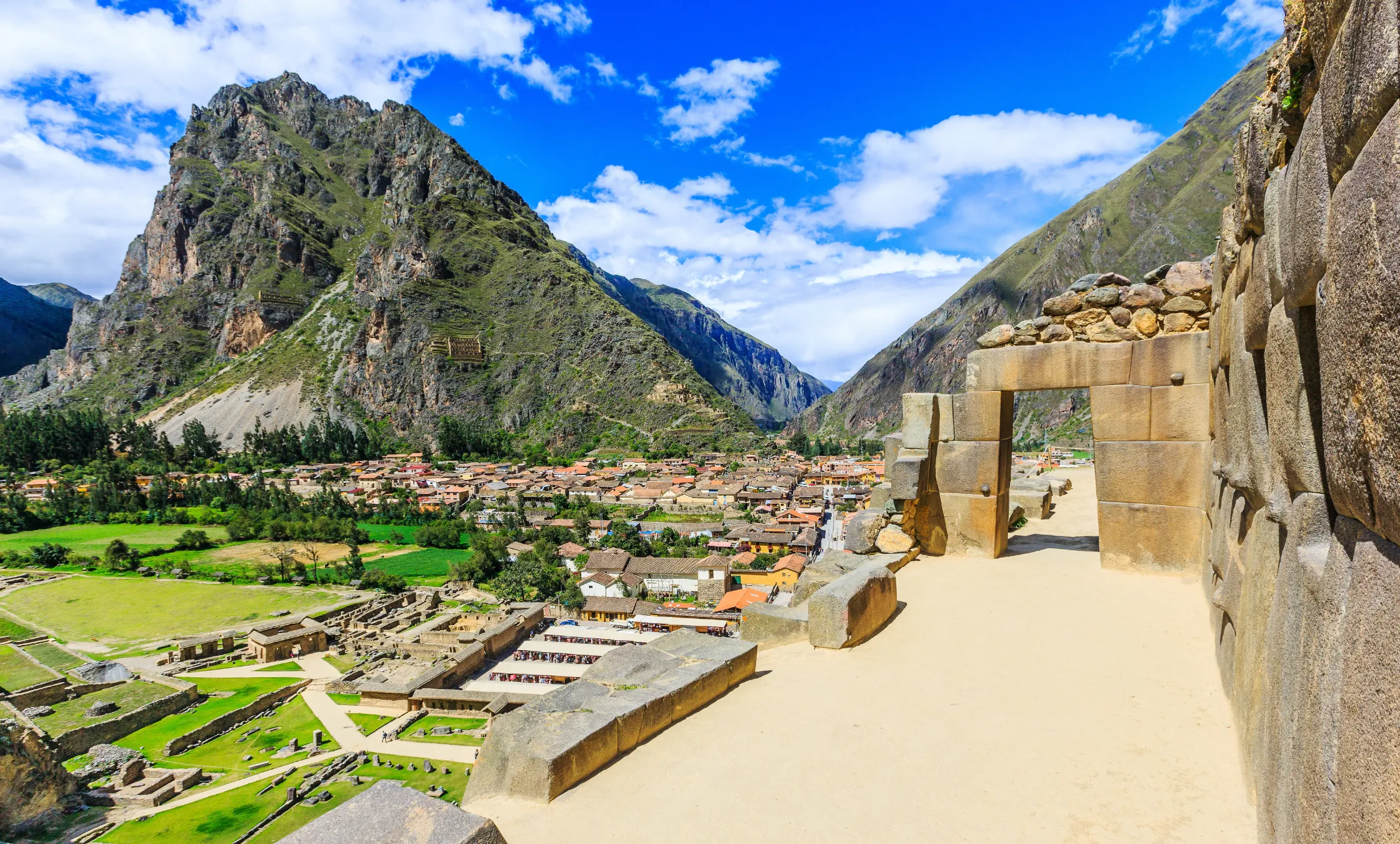 Scenic view of the Sacred Valley of the Incas featuring Ollantaytambo and the Andes Mountains in Peru