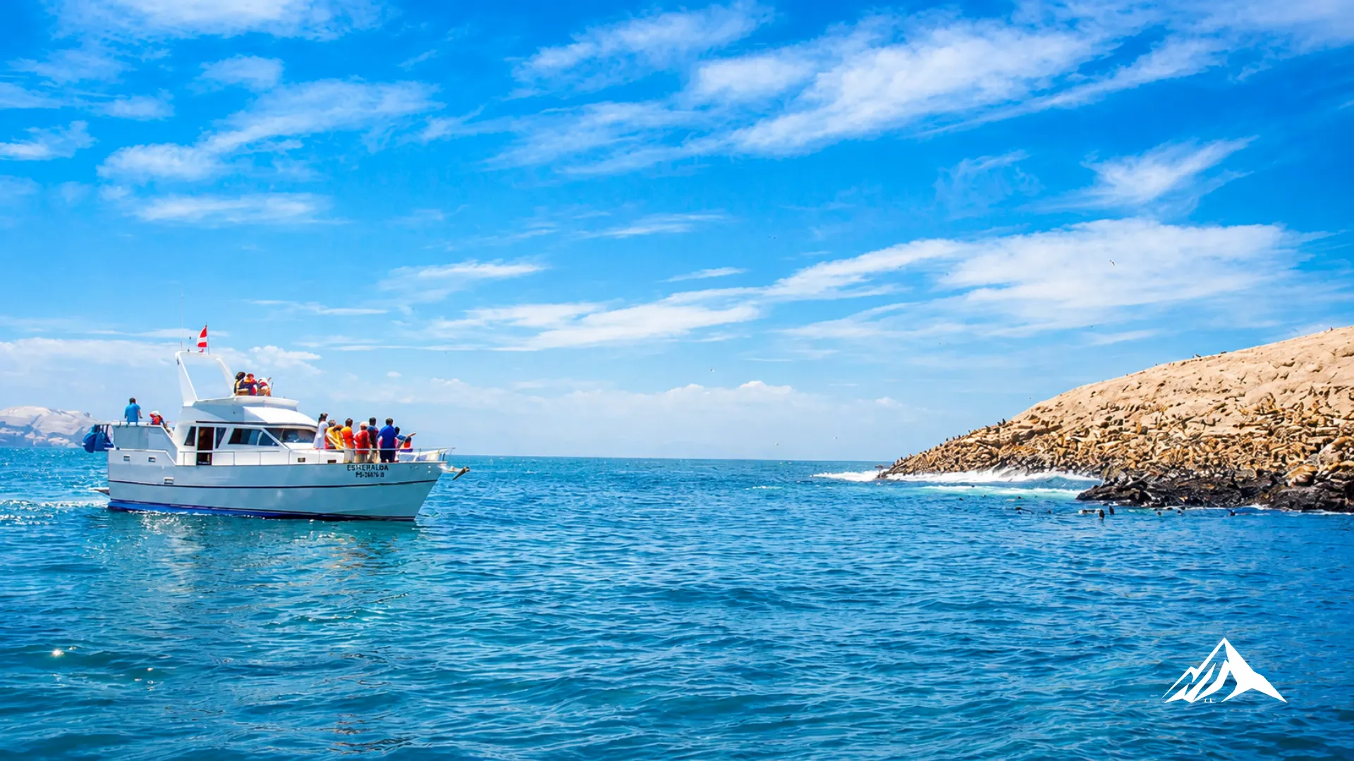 Tourist boat sailing from Callao to the Palomino Islands, Peru.