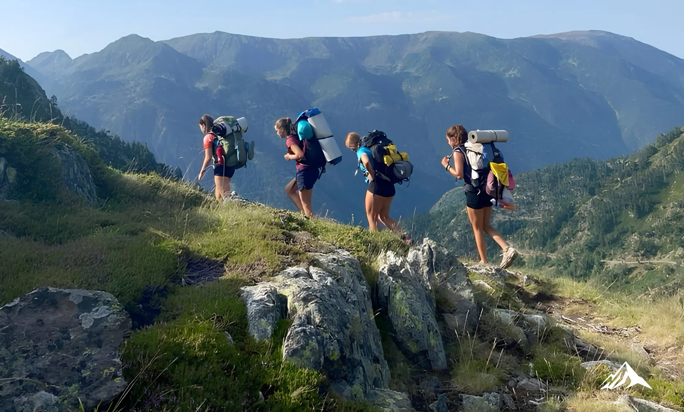 Travelers hiking through the Peruvian Andes while planning the cost of traveling to Peru.