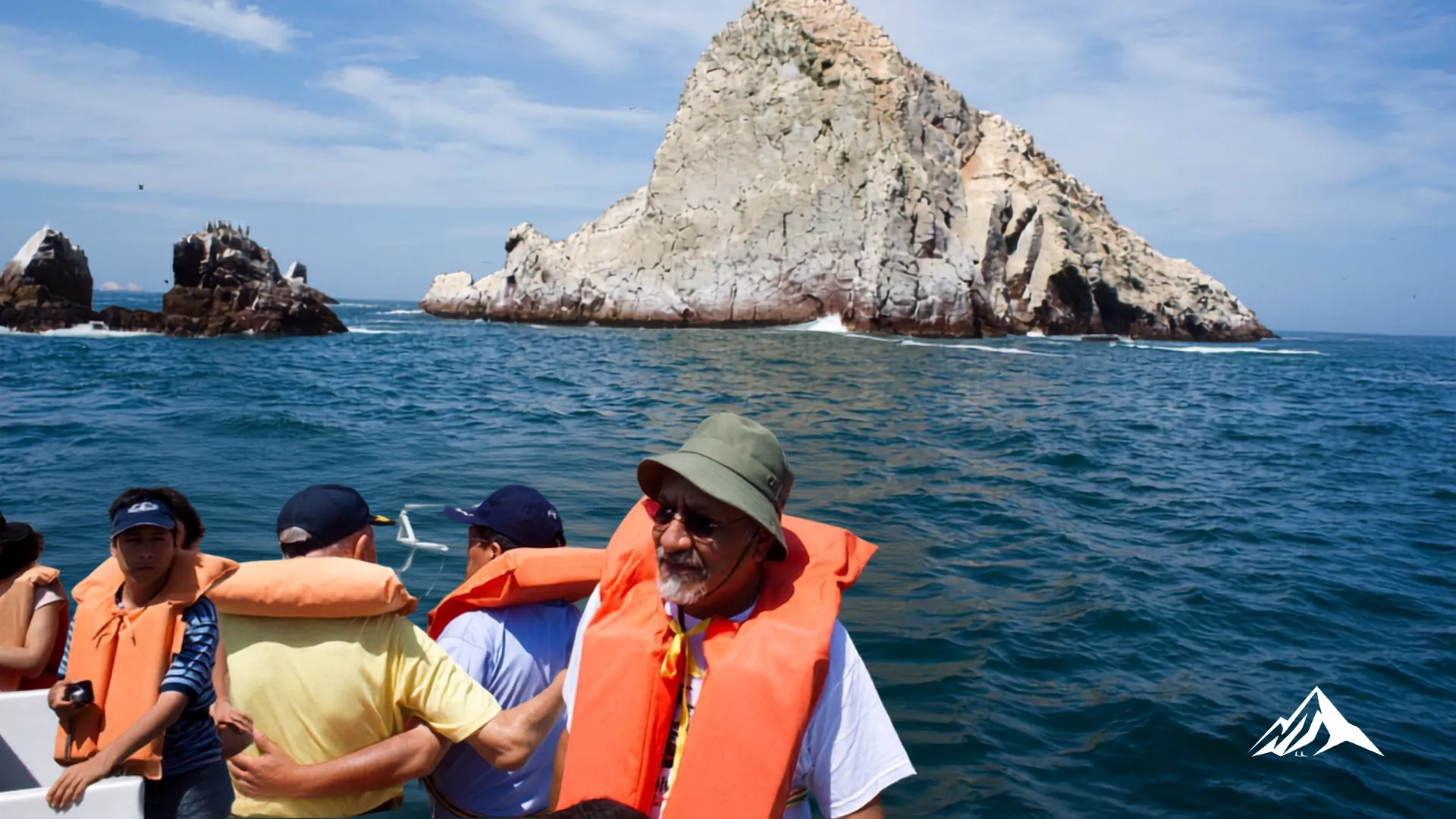Travelers enjoying a boat tour to the Palomino Islands near Callao, Peru.